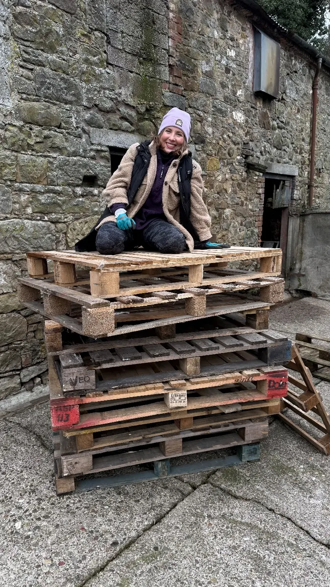 Stacking old pallets ready to reuse