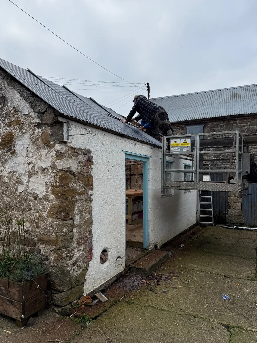 Working on the roof from a raised platform