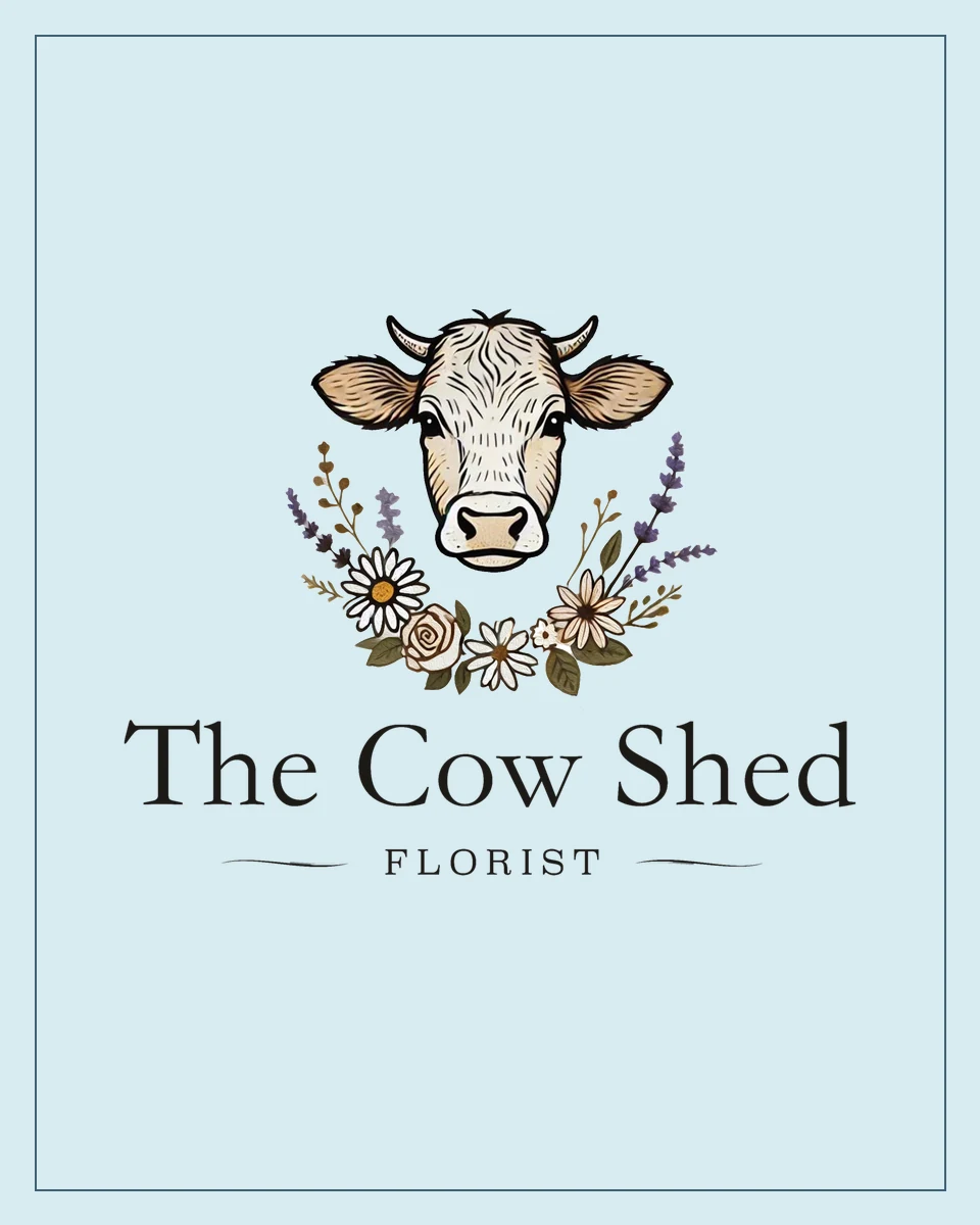The Cow Shed Florist logo on the duck-egg blue of the gift voucher